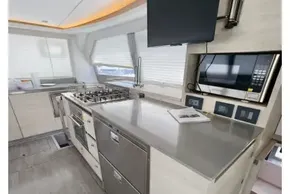 Modern kitchen interior on a 2020 Leopard 50 yacht, featuring sleek appliances and ample counter space.