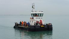 SHALLOW DRAFT MULTICAT WORKBOAT WITH DECK CRANE AND LARGE DECK SPACE