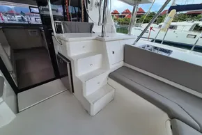Leopard 45 yacht interior with stairs, seating, and marina view, 2020 model.