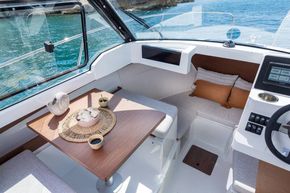 Jeanneau Merry Fisher 605 - port side saloon table and forward berth
