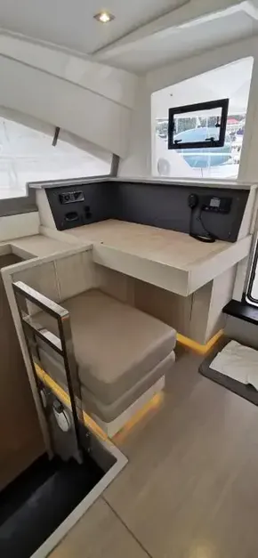 Interior of 2019 Leopard 51 Powercat with modern seating and workspace.