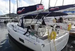 2020 Beneteau Oceanis 46.1 sailboat docked at marina, featuring dual helm and canopy.