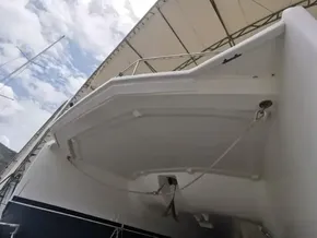 2015 Leopard 51 Powercat under a canopy with a clear sky.