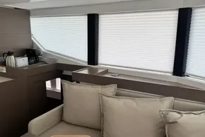 Interior of 2024 Leopard 40 Powercat with modern kitchen and comfortable seating.