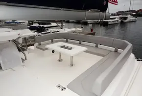 Modern Leopard 50 yacht, 2020 model, featuring spacious outdoor seating and table.