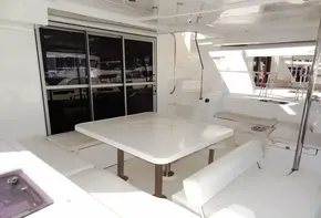 2015 Leopard 51 Powercat yacht interior with dining area and seating.