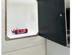 Storage compartment with fire extinguisher on Leopard 46 Powercat, 2025 model by Robertson and Caine.