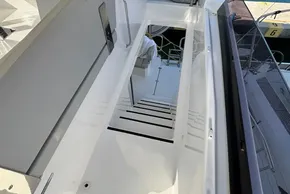 Staircase on 2024 Leopard 40 Powercat yacht, leading to lower deck.