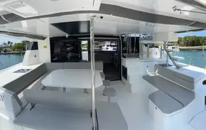 Leopard 50 yacht 2020 model, spacious outdoor seating and dining area.