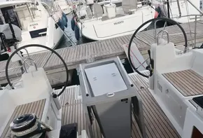 Cockpit view of 2019 Beneteau Oceanis 41.1 sailboat at marina dock.