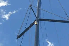 Mast of 2017 Lagoon 42 sailboat against a clear blue sky.