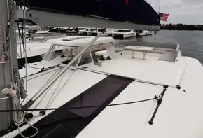 Leopard 50 catamaran, 2020 model, docked at a marina with other boats.