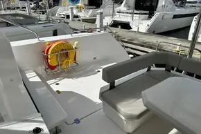 2025 Robertson and Caine Leopard 46 Powercat deck with seating and life preserver.