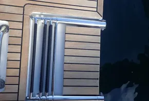 Stainless steel swim ladder on Jeanneau Sun Odyssey 440, 2019 model.