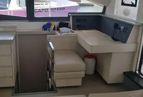 Interior of a 2017 Leopard 48 yacht with kitchen and seating area.