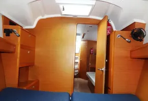 Interior cabin of 2017 Jeanneau Sun Odyssey 389 sailboat with wooden finish.