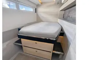 Modern cabin interior of 2020 Leopard 50 yacht with bed and storage.