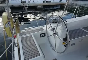 2017 Beneteau Oceanis 41 sailboat cockpit with steering wheel and seating.