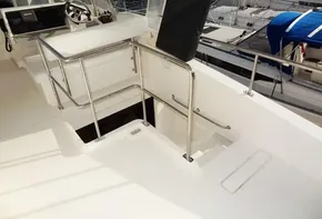 2017 Leopard 43 Powercat upper deck with helm station and stainless steel railings.