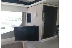 Interior of 2018 Leopard 45 yacht with mounted TV and modern cabinetry.