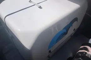 White generator on 2024 Lagoon 42 catamaran deck, labeled 