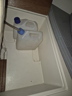 Storage for chemiloo and water containers
