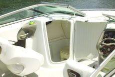 Crownline Bowrider 236 LS - A convenient on-board enclosed head features a sink, vent and electric light