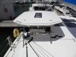 2021 Leopard 40 catamaran docked at marina, featuring spacious deck and modern design.
