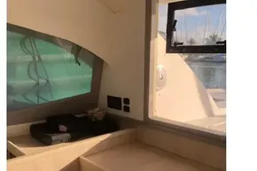 Interior of 2020 Leopard 40 yacht with desk and window view.