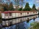 Residential mooring and garden with additional cabins