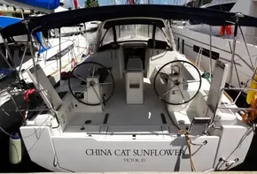 Beneteau Oceanis 38 sailboat, 2017 model, docked at marina, named China Cat Sunflower.