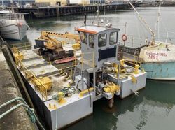 Self propelled work barge