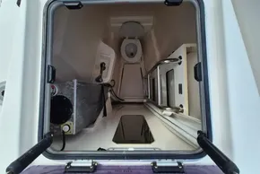Interior view of a 2020 Leopard 45 yacht's compact bathroom space.