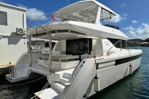 2025 Robertson and Caine Leopard 46 Powercat docked, showcasing sleek design and spacious deck.