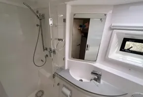 Modern bathroom in 2019 Leopard 51 Powercat yacht with shower and sink.