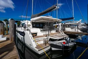 Luxury Leopard 46 catamaran docked at marina, 2025 model, with inflatable dinghy attached.