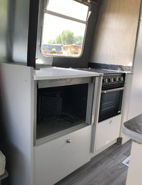 Full size cooker with glass cover, wood burning stove
