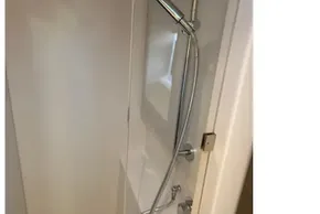 Modern shower in 2022 Leopard 42 yacht, featuring sleek chrome fixtures.