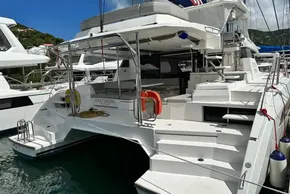 2021 Leopard 50 catamaran docked, featuring spacious deck and modern design.