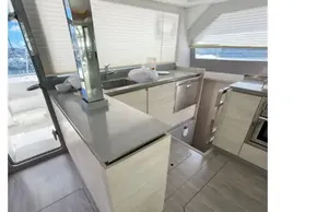Modern kitchen interior on 2020 Leopard 50 yacht, featuring sleek countertops and cabinetry.
