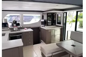 Modern kitchen interior of 2022 Leopard 45 yacht with sleek cabinetry and appliances.