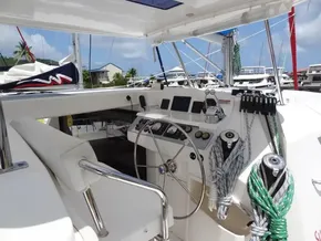 Helm of 2021 Leopard 40 catamaran with modern navigation equipment and rope storage.