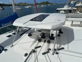 Sailing yacht Leopard 50, 2020 model, docked with ropes and winches visible.