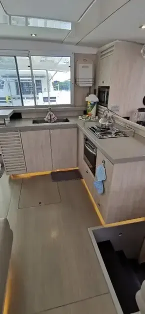 Modern kitchen interior of 2019 Leopard 51 Powercat yacht with appliances and ample counter space.