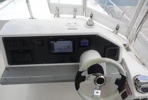 Helm station of 2020 Leopard 43 Powercat with navigation equipment and steering wheel.