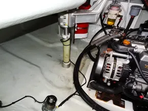 Engine room of 2021 Leopard 40 catamaran, featuring mechanical components and wiring.