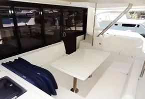 2017 Leopard 43 Powercat yacht interior with white seating and table.