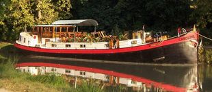 Beautiful Dutch barge currently run as a B&B on the Canal du Midi