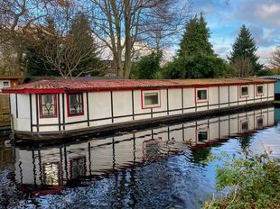 Residential mooring and garden with additional cabins