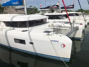 2020 Lagoon 42 catamaran named Darwin docked at a marina.